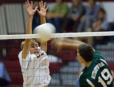 Robert Anderson seemed to have the net well taken care of as Westhampton Beach’s Collin Carrieri attempted a kill.