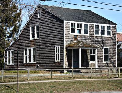 The Osborn House on Newtown Lane in East Hampton has been enjoying a very public face-lift over the past eight months. Its “before” state in March of this year.