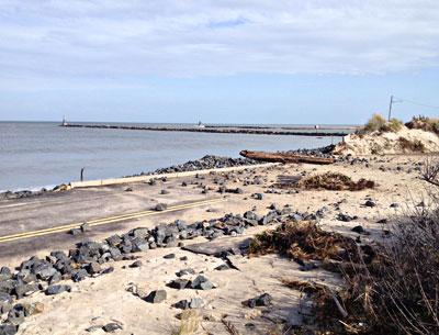 Rocks that once helped protect Soundview Drive in Montauk were thrown by the heavy surf onto the pavement.