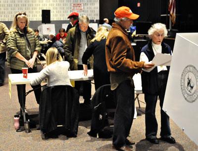 Voters cast ballots Tuesday afternoon in the East Hampton High School auditorium, where polls were understaffed, according to one worker, but still orderly.