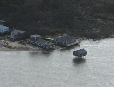 The owner of a badly exposed house at the end of Mulford Lane at Lazy Point, Amagansett, has asked the East Hampton Town Zoning Board of Appeals for a second time for permission to build a revetment to stave off its fall into the encroaching Gardiner’s Bay.