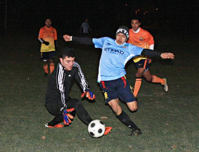 Bateman Painting’s Jonathan Lizano almost made it 3-2 in Monday’s second half, but Maidstone Market’s goalie, Alex Meza, made the stop.