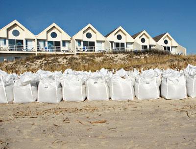 A committee named by the East Hampton Town Board will consider whether waterfront buildings, like this one on the ocean in Montauk that was threatened by Hurricane Sandy, should be protected.