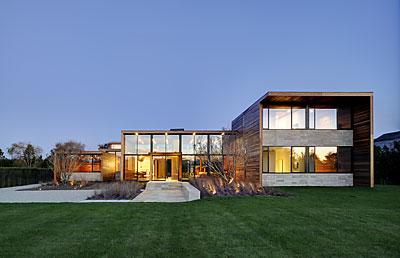 Mahogany boards and travertine marble define the house, both inside and out.