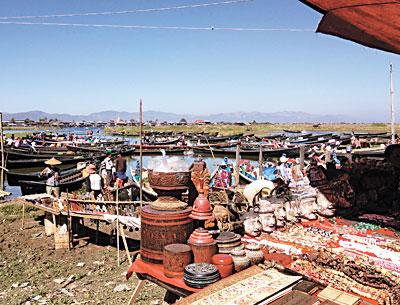 Laura Donnelly’s trip to Southeast Asia included stops at several markets (the floating market in Myanmar pictured above), temples, shrines, and other exotic locales.