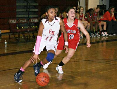 Kaelyn Ward, with the ball above, led East Hampton with 18 points in 64-51 win here over Miller Place.