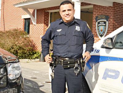 East Hampton Village Police Officer Julio Galeano, seen here when he was honored as the top cop for 2012, will have a hearing soon.