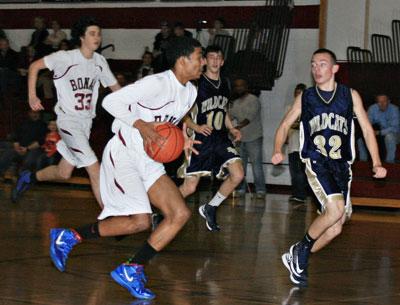 Rolando Garces, in action against Shoreham-Wading River above, went on to score a career-high 33 points at Elwood-John Glenn two days later.