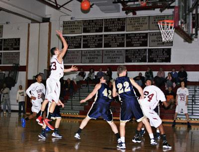 Thomas King, lofting a jump shot above, took the game over in the final minutes.