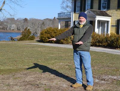 A brass-gilt button with a Dutch tulip from a 17th-century men’s coat was just one of the thousands of artifacts found at Shelter Island’s Sylvester Manor farm by Stephen Mrozowski. He returned to the farm last week to determine the location of hundreds of workers who may be buried there.