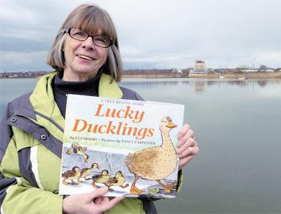 Eva Moore, standing at Fort Pond in Montauk, knew immediately that the story of the rescue of several ducklings would make a good picture book.