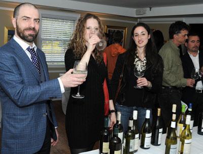 Gioveanni Caveggia assisted Jennifer Etzkin, center, and Sarah Diehl of the East Hampton Grill in their wine exploration at the Vias Imports First Annual Spring Tasting, held at the Palm restaurant on April 23.