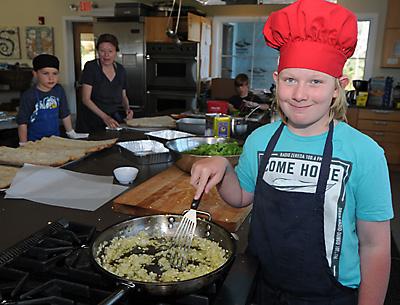 Stephen Cummings helped prepare lunch for his fellow students at the Hayground School in Bridgehampton on Tuesday.