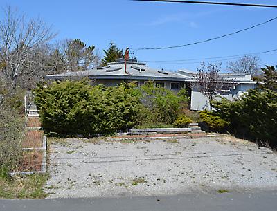 Steven Dubb bought a house at 142 Central Avenue in Beach Hampton in August. It was described by several speakers at the meeting as a dilapidated eyesore