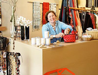 Theresa Davis, the manager of LongHouse Reserve’s new Instore museum shop, is surrounded by one-of-a-kind objects from the world’s most exotic places.