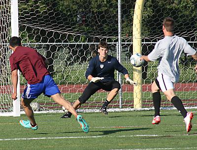 One of those who participated in East Hampton High’s first alumni boys soccer game Friday was Brandon West, whose Messiah College team won the national Division III championship last fall.