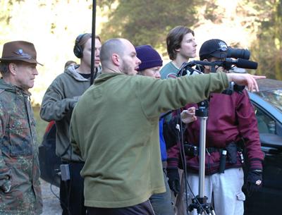 Brooks Elms, pointing, on the set of “Schooled.”