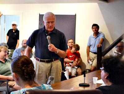 Residents of Sagaponack, including Gerard Kleinbaum, standing, gathered Saturday to ask questions about the village board’s idea to create its own police department.