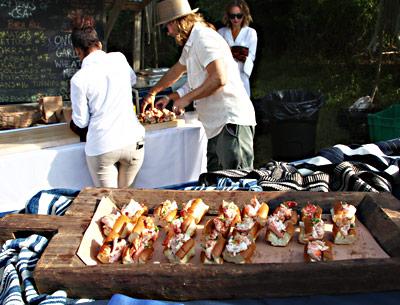 Lobster rolls served up from near the Quail Hill farm stand were among the hors d’oeuvres offered at the community-supported farm’s At the Common Table benefit Saturday.