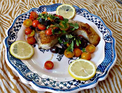 Acid and herbs are great complements to swordfish and can be improvised as needed, as in this Mediterranean-inspired recipe with black olives and tomatoes.