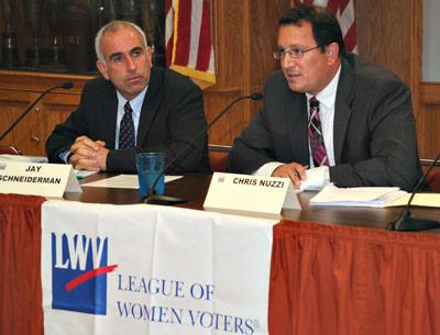 County Legislator Jay Schneiderman and Southampton Town Councilman Chris Nuzzi at a debate in East Hampton. Mr. Nuzzi hopes to unseat Mr. Schneiderman on Nov. 5.