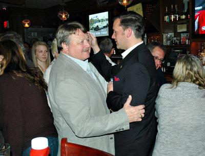 Town Clerk Fred Overton, left, who won a sole Republican seat on the town board, was congratulated by Carl Irace, who lost his bid for town justice, at Indian Wells Tavern on Tuesday.