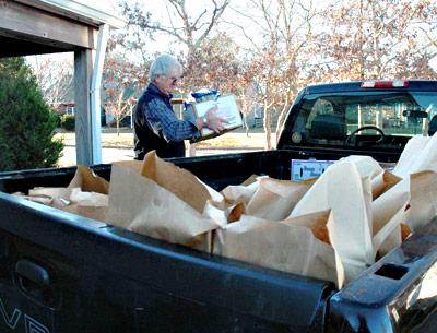 John Ryan, a volunteer with the East Hampton Food Pantry, loaded his truck with bags of food to be transferred to the pantry’s satellite location in Amagansett. With winter approaching, pantry officials said they are operating on dangerously thin supplies.