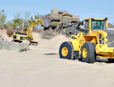 A state judge has issued a restraining order blocking a Georgica Beach-front property owner from continuing work on a protective sea wall.