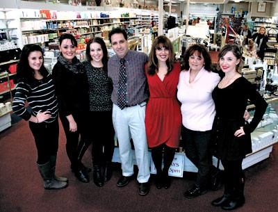 Under new ownership, the White’s team includes some new faces and some familiar ones — from left, Vesa Islami, Jessica Medina, Christina Keerd, Vincent Alibrandi, Diana Dolling-Ross, Dyana Nesbitt, and Megan Born.