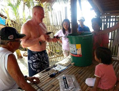 Brian Lydon of East Hampton demonstrated a water-filtration kit for victims of Typhoon Haiyan in the Philippines.