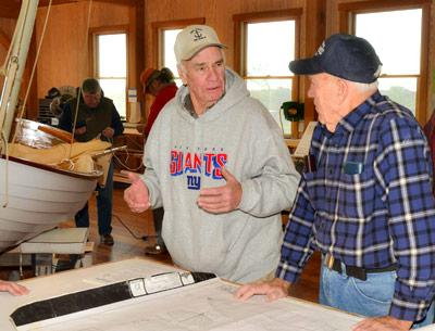 John Reinbold, left, with Don Schreiber, a member of the society, at the Community Boat Shop in Amagansett on Saturday