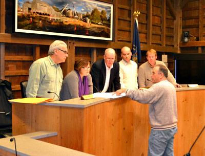 Cate Rogers, second from left, returned to serve on the East Hampton Zoning Board of Appeals after a four-year absence. With her Tuesday at Town Hall were Don Cirillo, Alex Walter, David Lys, and Bryan Gosman, as they discussed a pending application with the Planning Department’s Brian Frank.