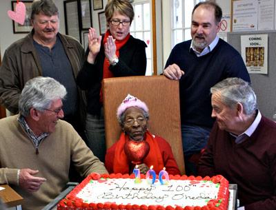 Oneda Dixon got best wishes from Supervisor Larry Cantwell, left, Mayor Paul F. Rickenbach Jr., right, and town board members Fred Overton, Kathee Burke-Gonzalez, and Peter Van Scoyoc.