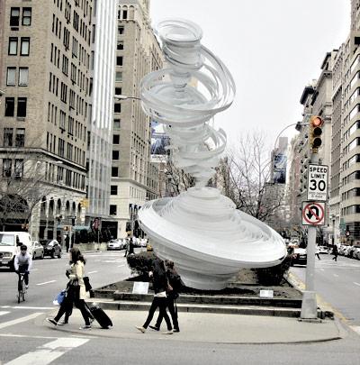 “Cyclone Twist,” above, and “Hoop-La,” below, two of seven large painted aluminum and fiberglass sculptures by Alice Aycock, were recently installed on the Park Avenue median between 52nd and 66th Streets.