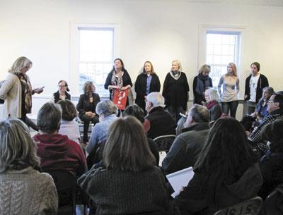 Town Councilwoman Sylvia Overby addressed a packed audience at Ashawagh Hall, while members of the East Hampton Arts Council, standing along the wall, looked on during the group’s first public meeting.