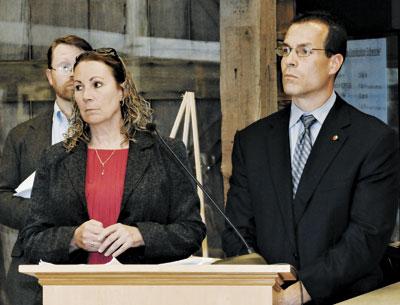 Steve Couch, at rear, and Anthony Ciorra of the Army Corps of Engineers and Sue McCormick of the state’s Department of Environmental Conservation laid out plans for the downtown Montauk beachfront.