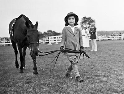 Jacqueline Bouvier led a pony at the Southampton Riding and Hunt Club in this August 1934 photograph.