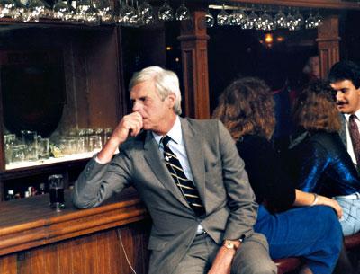 George Plimpton looking pensive. Was he pondering a gig as a bartender?