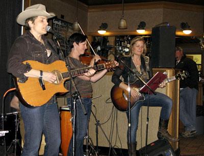 Inda Eaton, left, and Nancy Atlas, on guitar, were joined at their Casper shows by Jen DePaolo of the Wyoming Symphony Orchestra.