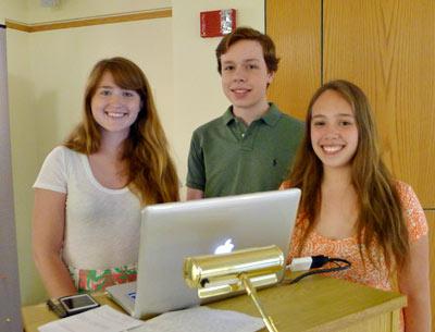 Daisy Kelly, left, Conrad Kabbaz, and Serrana Mattiauda, interns with the Third House Nature Center, talked about the health and environs of Big Reed Pond in Montauk on Friday.