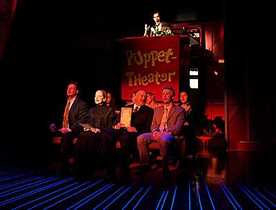 Aloysius Gigl, Isabel Keating, Andrew Weems, Michael Benz, Emily Trask, Julia Motyka, Carson Elrod, from left, in “Travesties,” a Tom Stoppard play about artists and revolutionaries performed for the tanned and the shellacked.