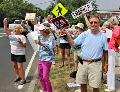 About 40 people protested a proposed CVS pharmacy at the corner of Main Street and the Bridgehampton-Sag Harbor Turnpike in Bridgehampton last Thursday.