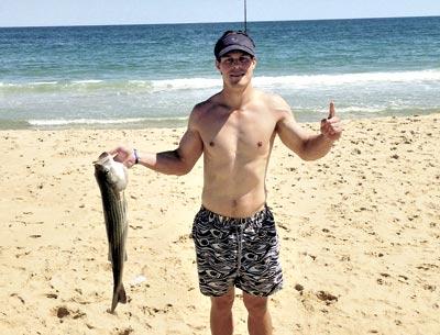 Danny Savage caught this 32-inch striped bass on Amagansett’s ocean side Sunday.