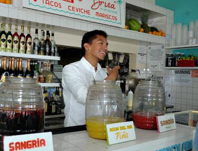 From the shady turquoise tables outside to the bright interior, the taqueria La Brisa is warm and welcoming.