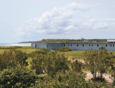 The East Deck Motel, long a visual cornerstone of Ditch Plain, is about to be converted into a private membership beach club, according to plans submitted to the East Hampton Town Planning Board.