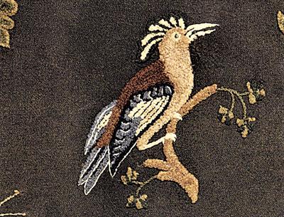 A hoopoe bird, a detail from Mercy Huntting’s yarn-sewn rug. At the time the rug was made, in the early 19th century, well-read people were captivated by the exotic birds and flowers. The hoopoe is native to North Africa and Eurasia.