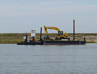 Heavy equipment was in place for the dredging of Napeague Harbor’s west channel, which commenced yesterday.