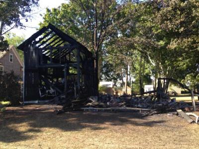 Little is left of the barn at 602 Townline Road in Sagaponack after a fire on Sunday.