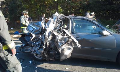 Two girls and one of their mothers were injured Friday morning after the small car they were riding in was apparently struck by a flat-bed truck.