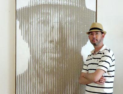 Colin Goldberg posed with an uncharacteristically figurative self-portrait at the Southampton Arts Center this summer.